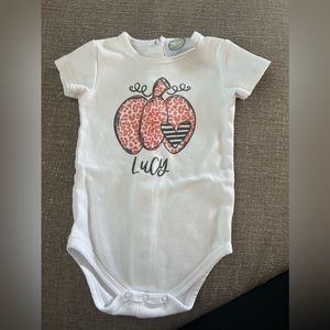 “Lucy” pumpkin onesie